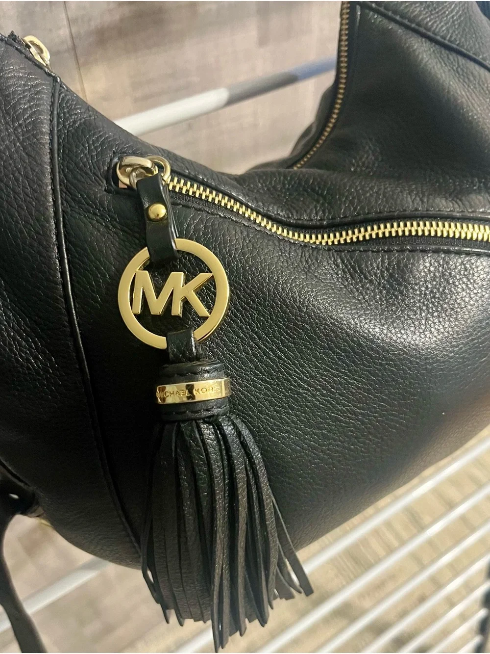 Michael Kors Black Pebbled Leather Hobo with Gold-Tone Tassel Charm